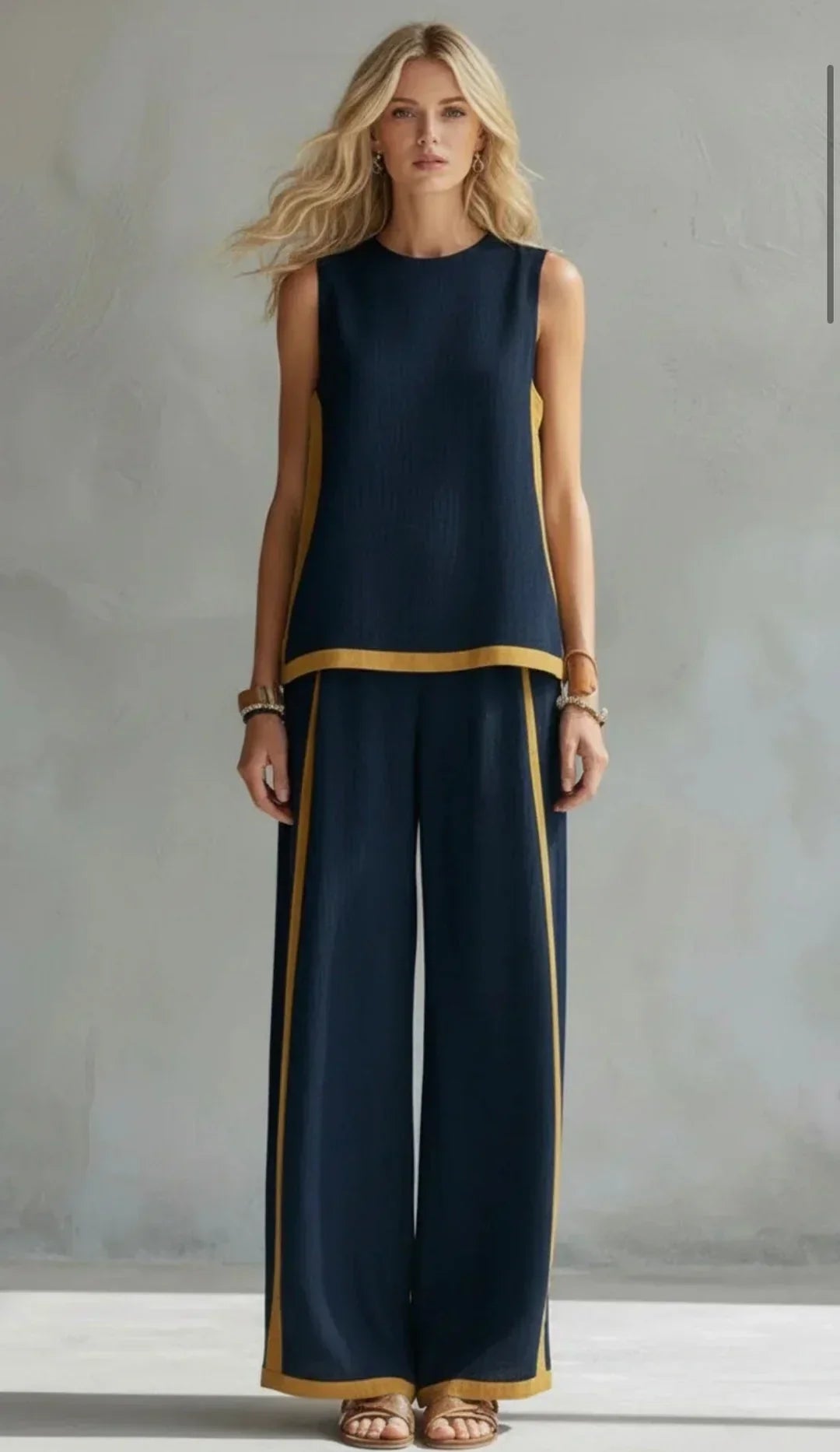 Ensemble Ursula Danoir Paris avec gilet et pantalon gris bicolores, style chic-décontracté, finitions élégantes.