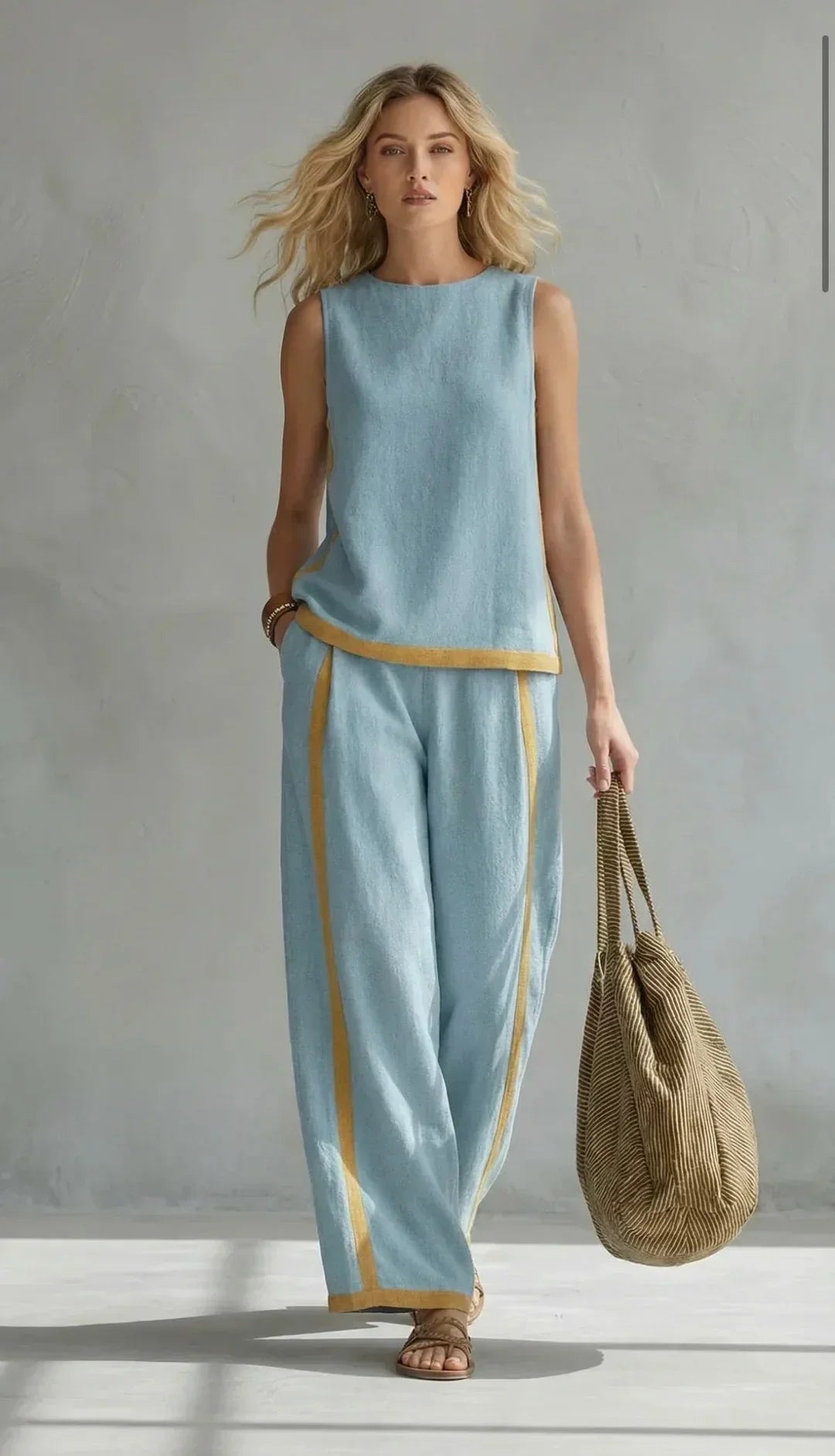 Ensemble Ursula Danoir Paris avec gilet et pantalon chic-décontracté gris à finitions bicolores, vue de face.