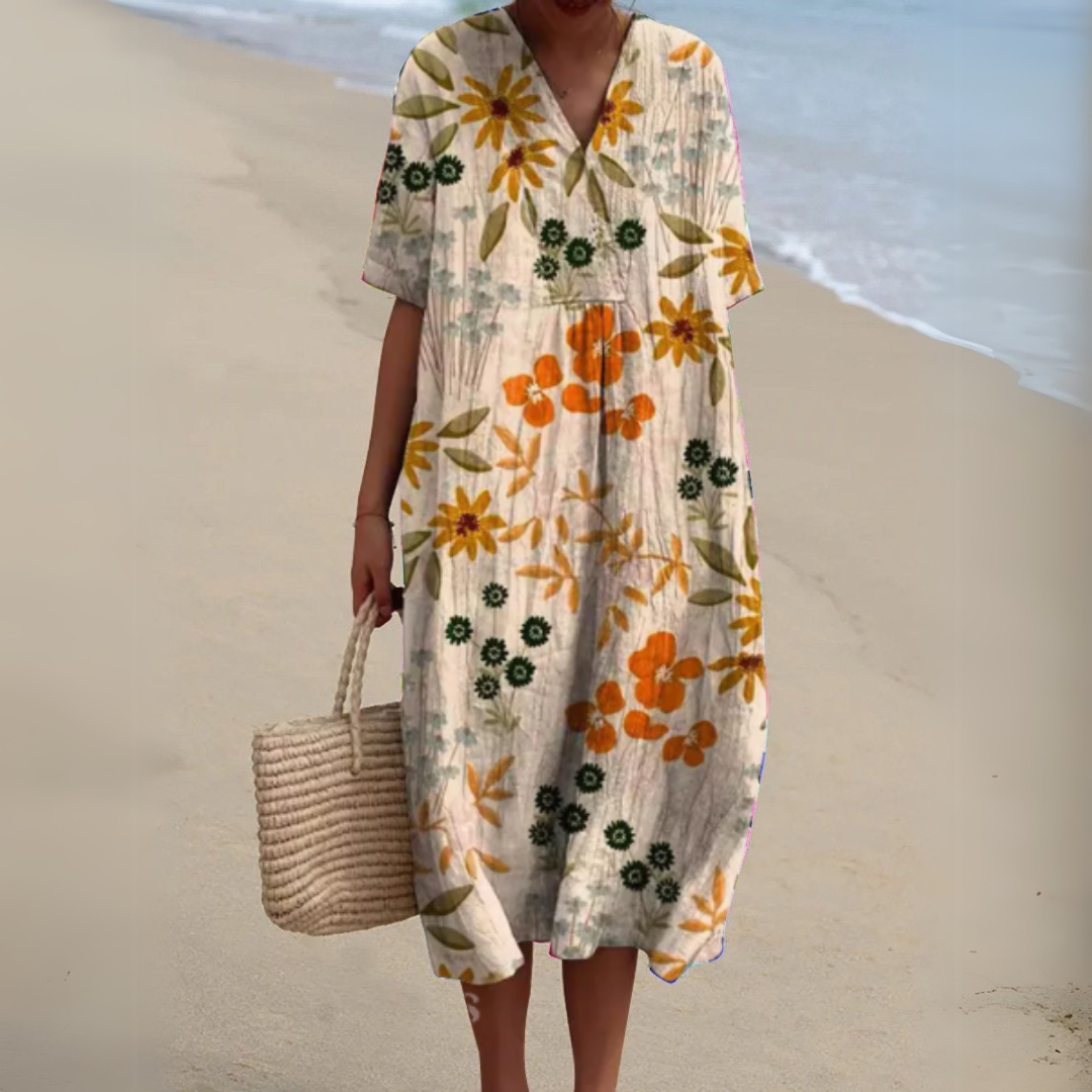 Robe fleurie élégante Nathalie de Danoir Paris, en tissu léger avec motif floral, vue de face sur mannequin.