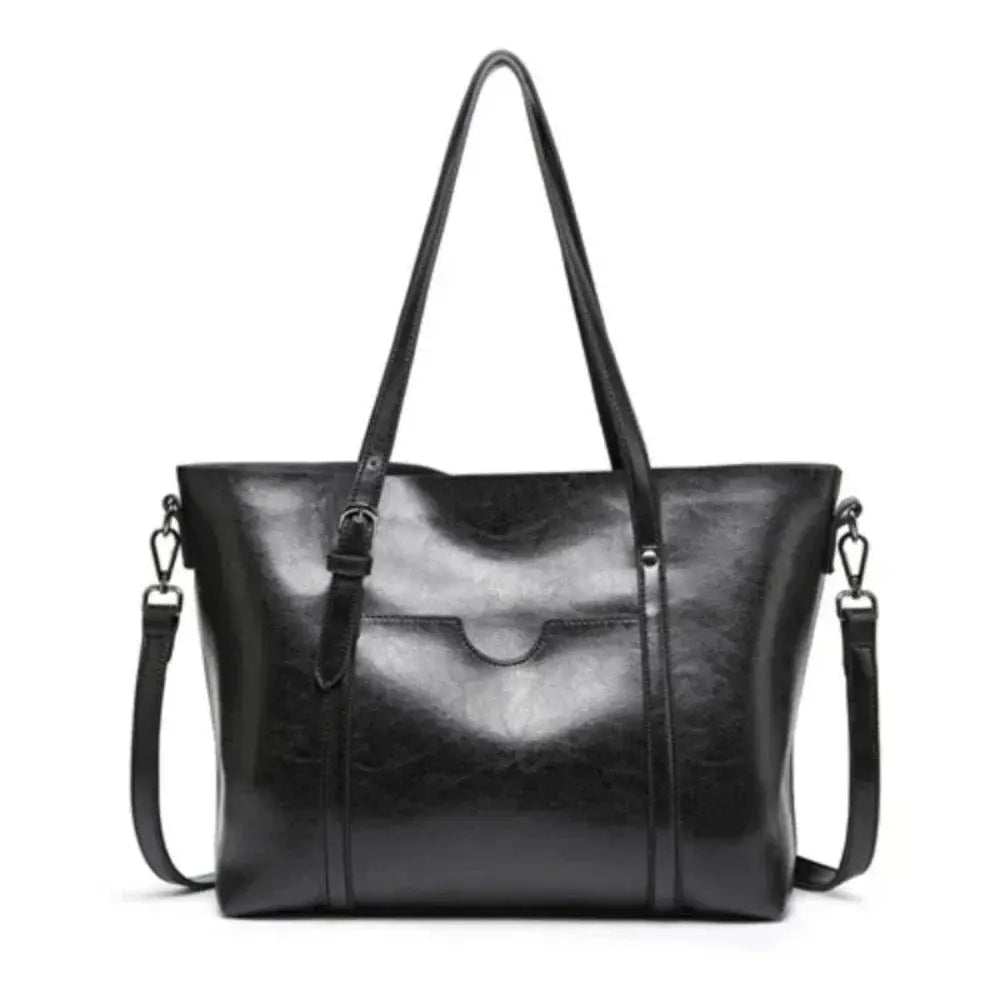 Sac à main Blythe Danoir Paris en cuir élégant avec détails sophistiqués, parfait pour un style chic et intemporel.