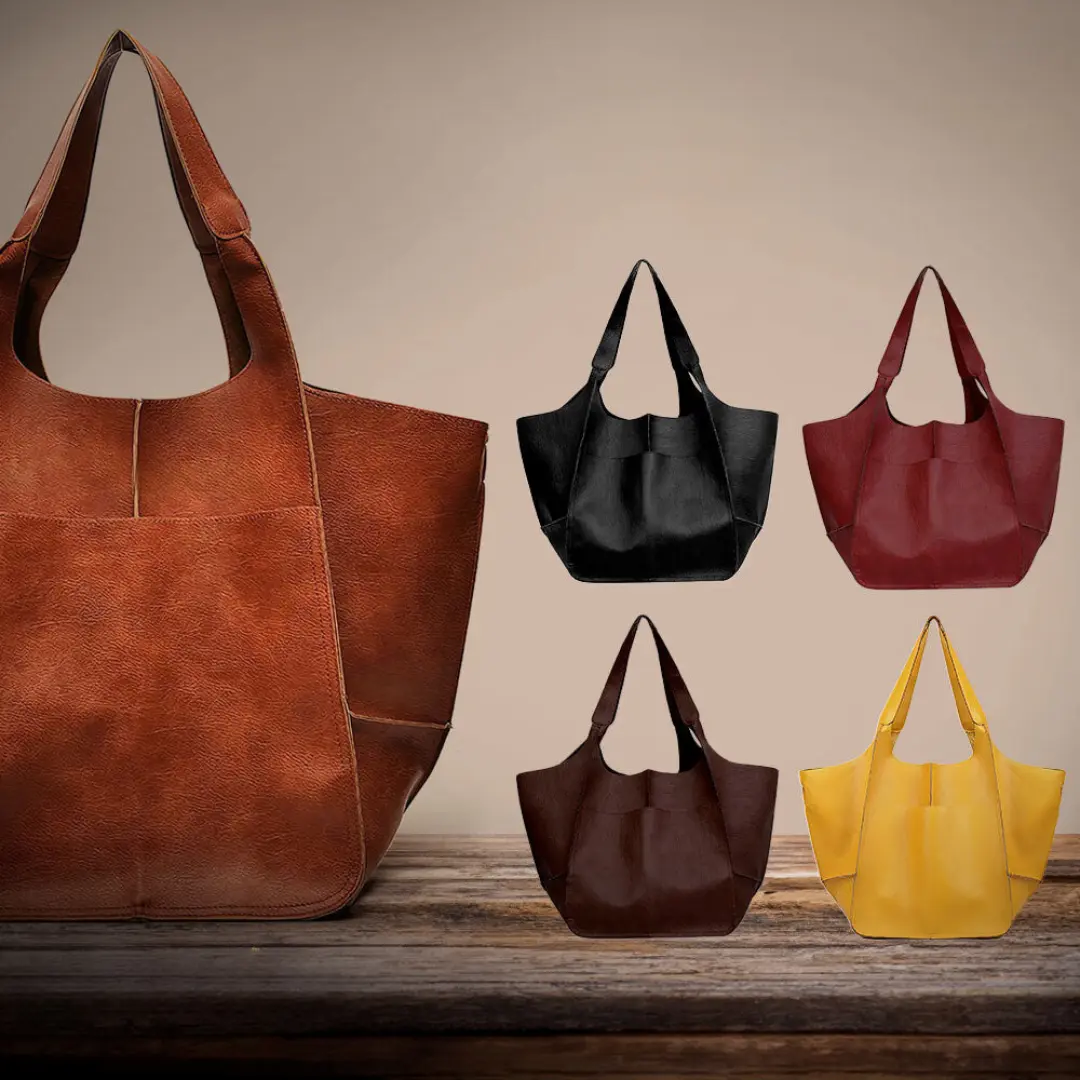 Sac vintage Cecilia de Danoir Paris, en cuir avec poignées en bois, style nostalgique et élégant, porté sur l'épaule.