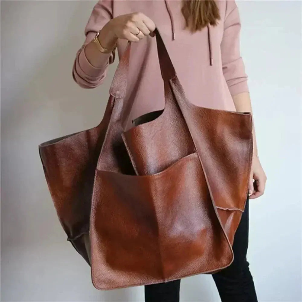 Sac vintage Cecilia de Danoir Paris, look nostalgique avec détails en cuir et bandoulière élégante, vue de face.