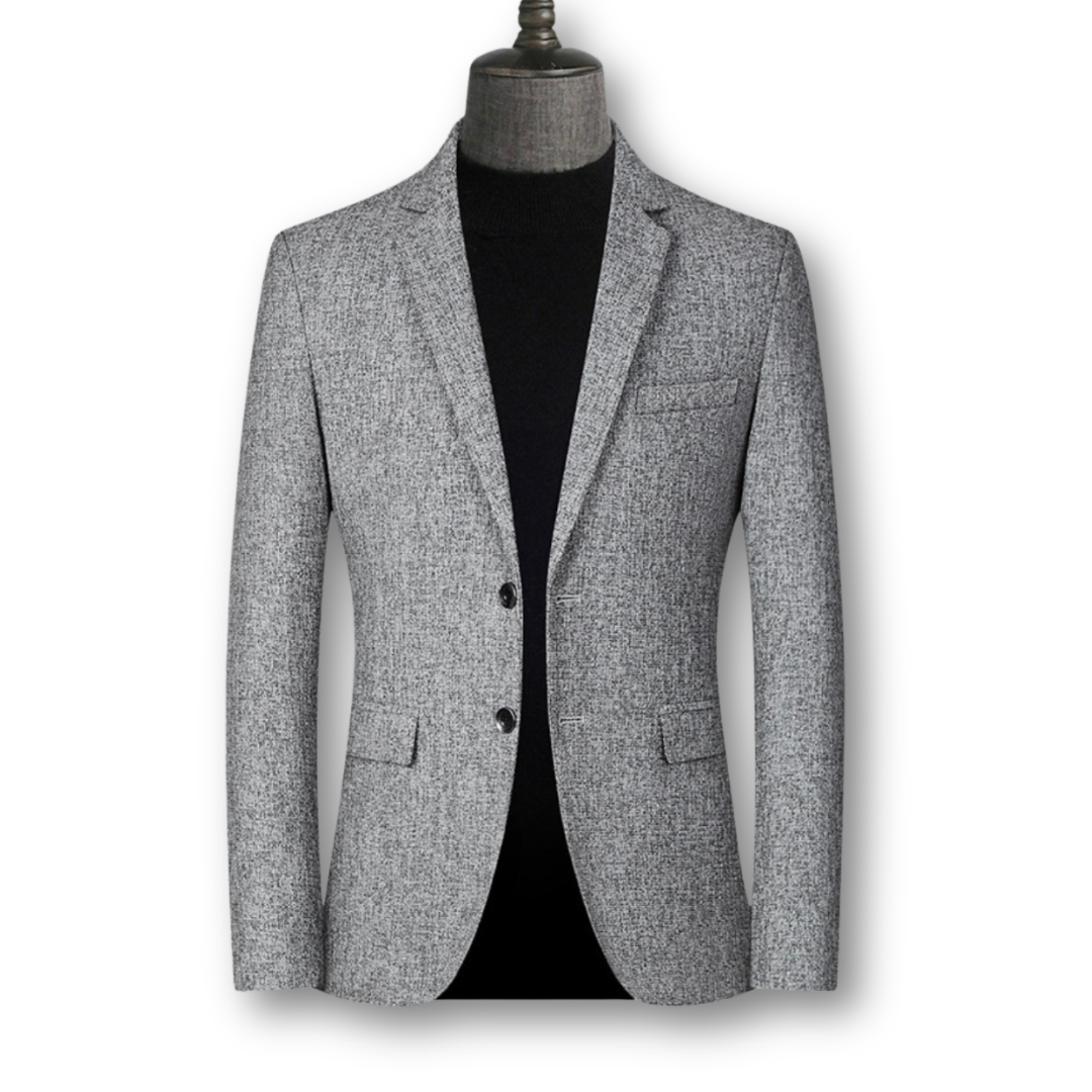 Veste blazer élégante en tissu écossais de Danoir Paris, coupe ajustée et détails sophistiqués pour un look chic.