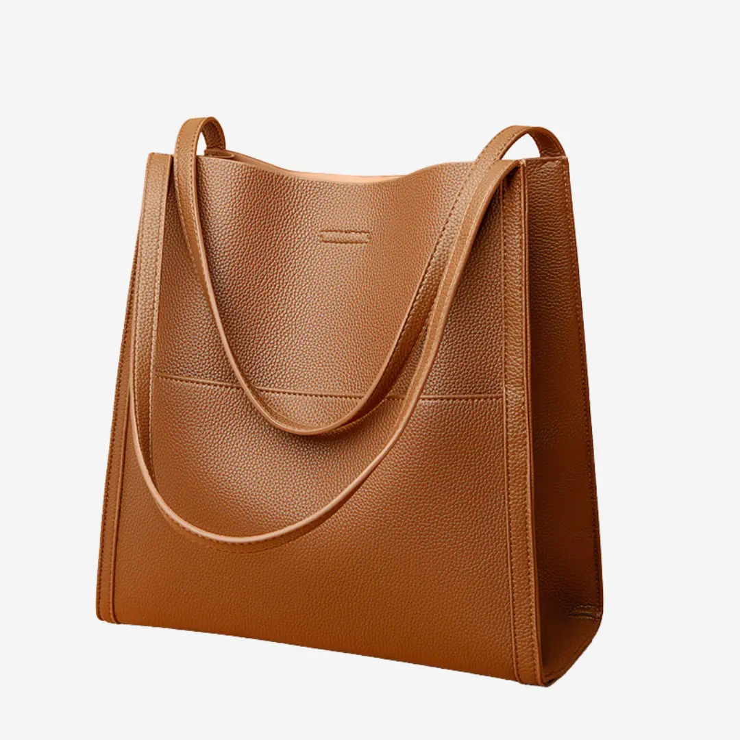 Sac à main en cuir Elise de Danoir Paris, élégant et sophistiqué, avec détails en cuir et poignée en métal visible.