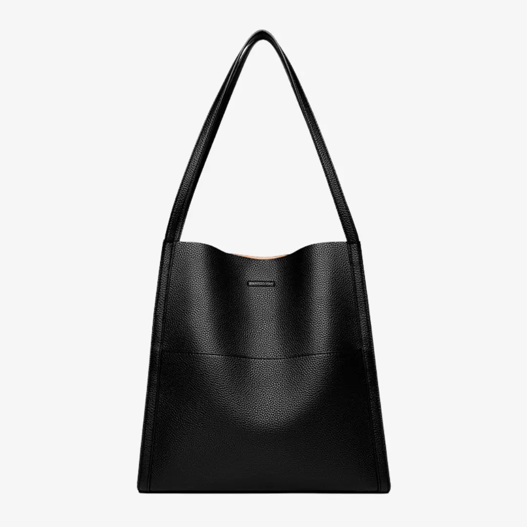 Sac à main en cuir Elise de Danoir Paris, élégant et sophistiqué, avec poignée en cuir et détails modernes.