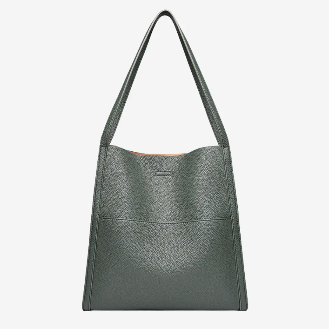Sac à main en cuir Elise de Danoir Paris, élégant et tendance, avec détails en cuir naturel et poignée en cuir.