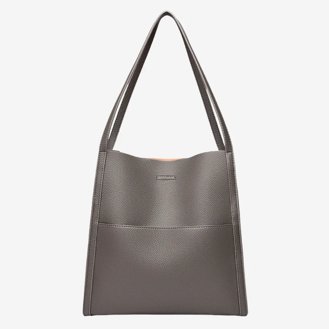 Sac à main en cuir Elise de Danoir Paris, élégant et sophistiqué, avec poignées et détails en cuir naturel.
