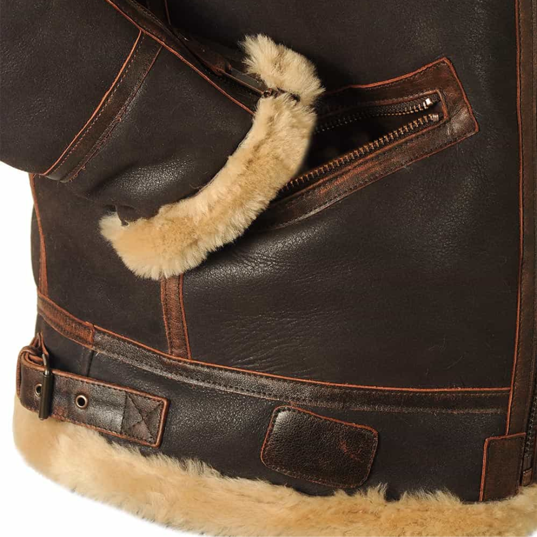 Blouson aviateur classique Danoir Paris en cuir marron, doublure rembourrée et détails en métal, vue de face.