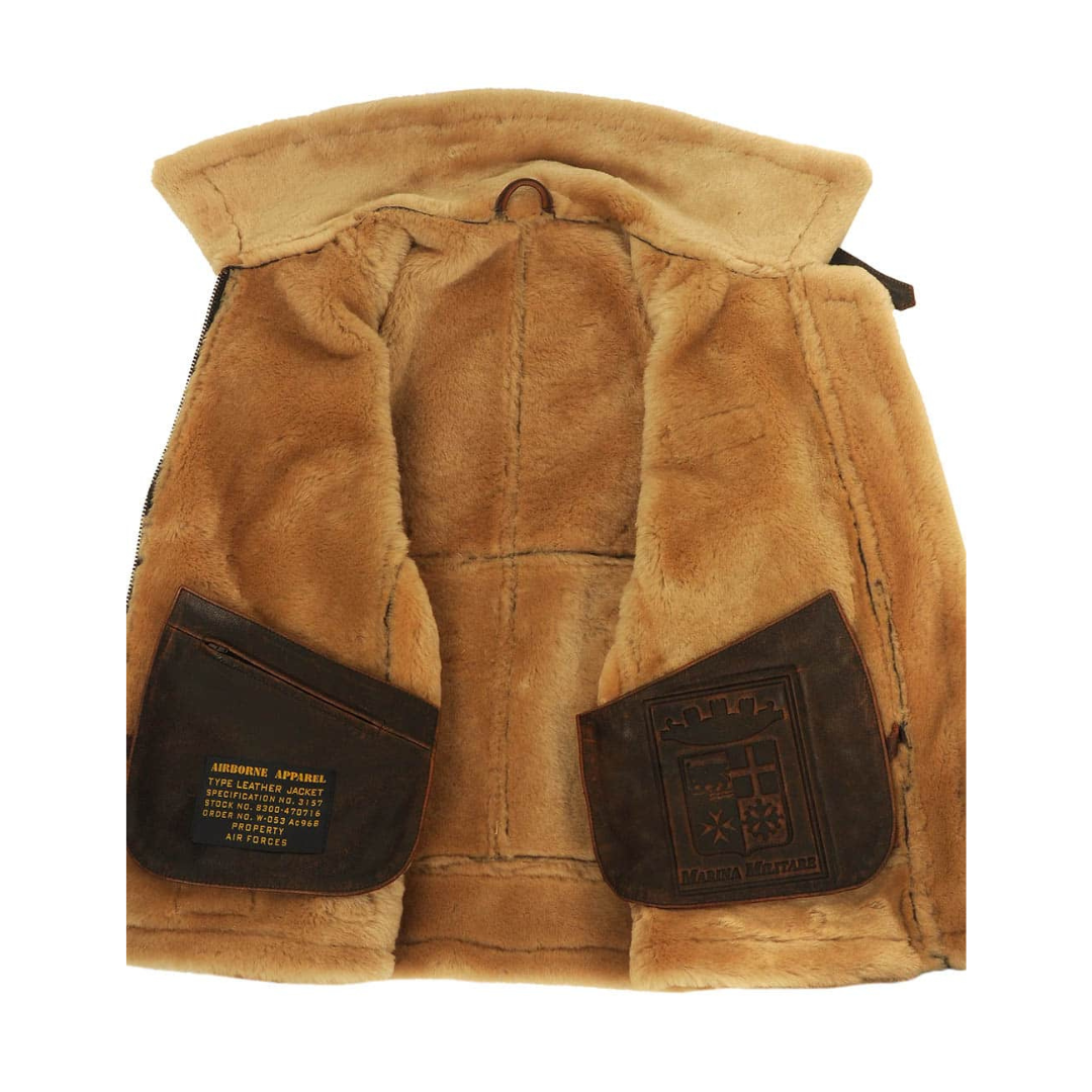 Blouson aviateur classique Danoir Paris, coupe ajustée, en cuir marron avec doublure en polyester, style vintage et élégant.