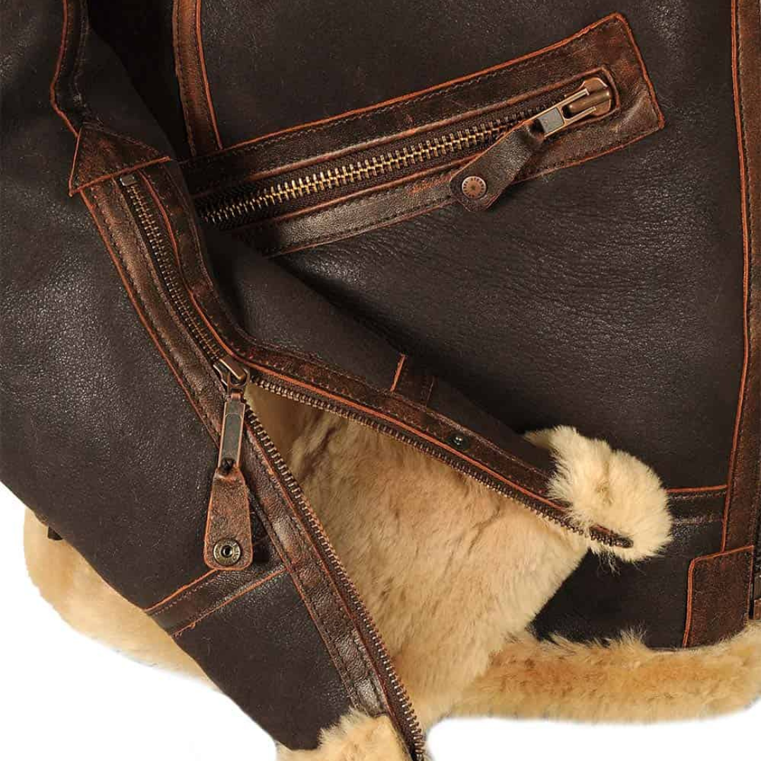Blouson aviateur classique Danoir Paris, veste en cuir marron avec col en fausse fourrure et fermeture zippée, style élégant et intemporel