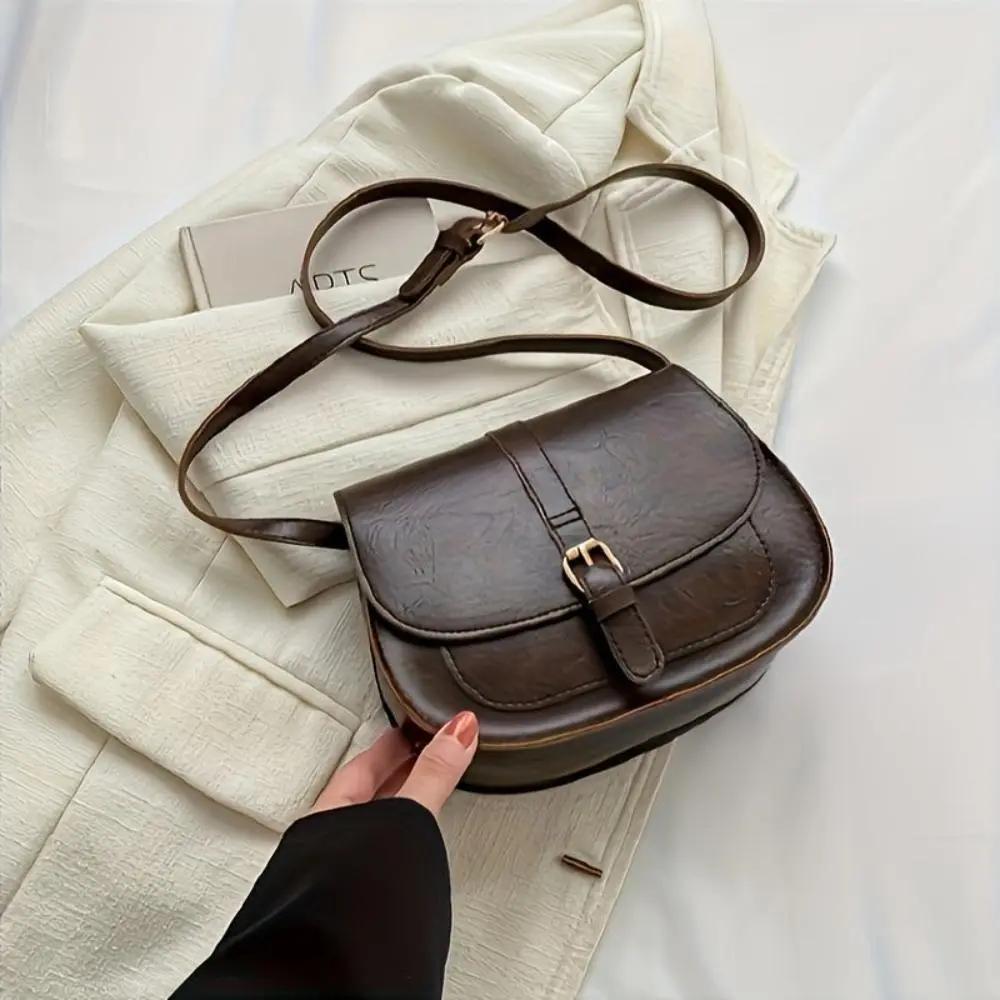 Sac à main Sienna de Danoir Paris, sac élégant en cuir avec poignées et détails sophistiqués, vue de face.