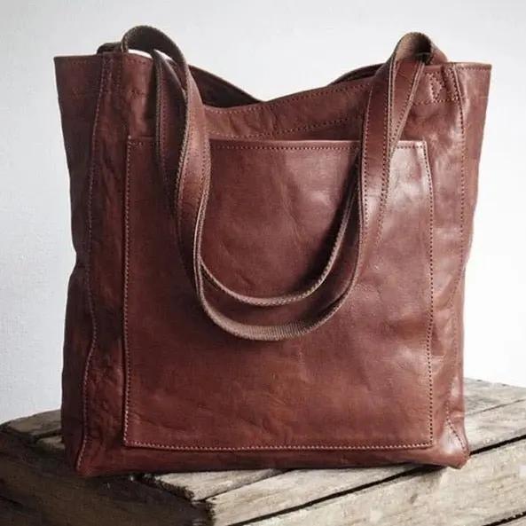Sac de ville élégant Lila en cuir de Danoir Paris, avec poignée et détails sophistiqués, vue de face.