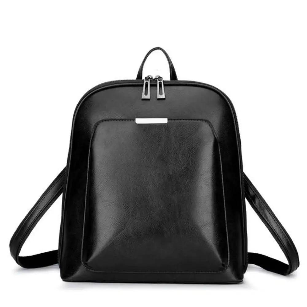 Sac à deux zips Naomi de Danoir Paris, élégant sac en cuir noir avec compartiments zippés, style intemporel et simplicité raffinée.
