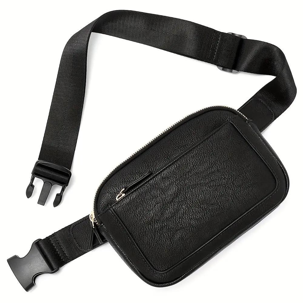 Sac bandoulière Aspen Sport Danoir Paris Nina, en cuir noir avec détails en métal, porté sur l'épaule.