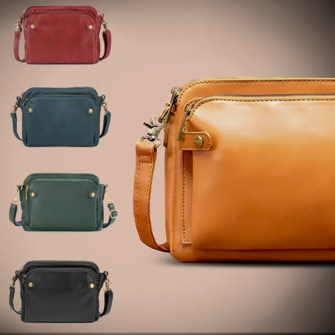 Sac à main Celia Danoir Paris, élégant et intemporel, en cuir noir avec poignées en métal or, vue de face.