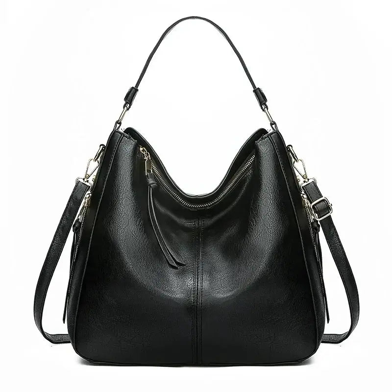Sac élégant en cuir Romy de Danoir Paris, sac à main sophistiqué avec finition soignée et poignées en cuir.
