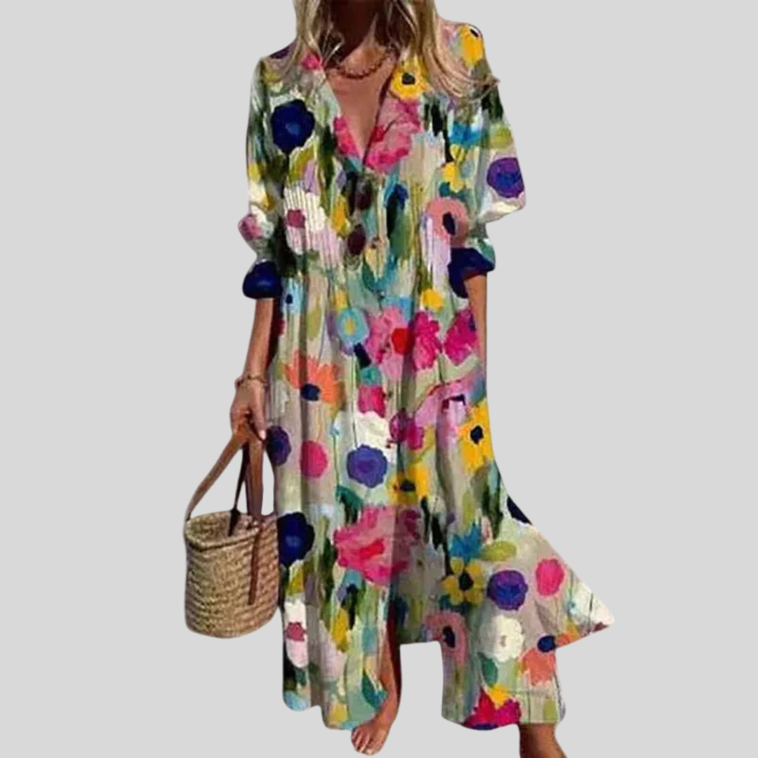 Robe maxi bohémienne élégante Zariah de Danoir Paris avec motifs multicolores, tissu fluide et style sophistiqué.