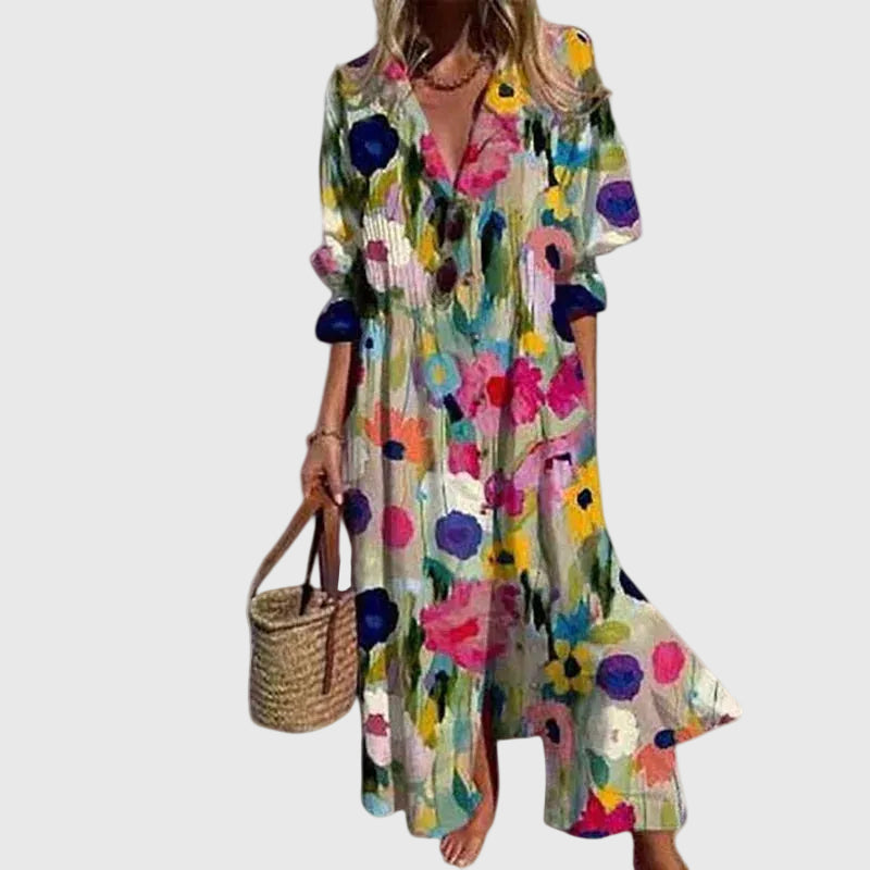 Robe maxi bohémienne élégante Zariah de Danoir Paris avec motifs multicolores, longue et fluide.