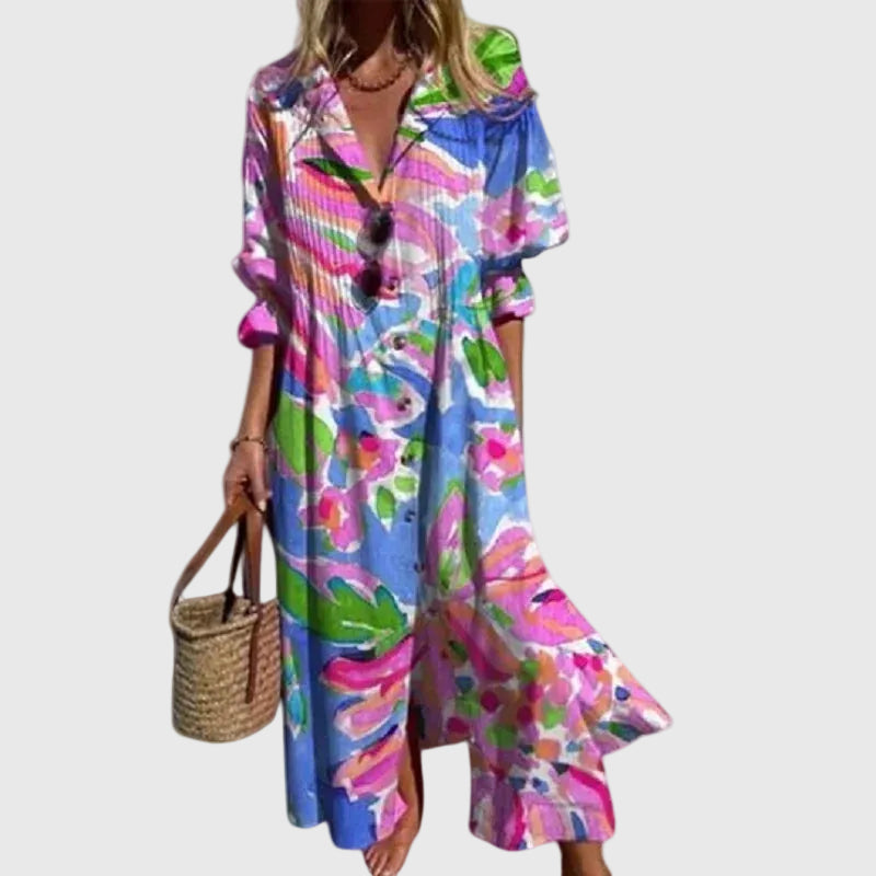 Robe maxi bohémienne élégante Zariah de Danoir Paris avec motifs colorés, tissu fluide et style décontracté.