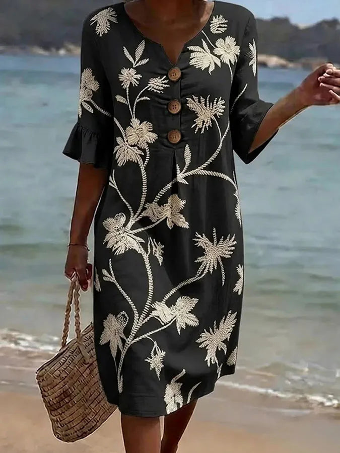 Robe décontractée pour femme Danoir Paris avec motif floral, tissu noir, coupe confortable et style élégant pour toutes occasions.