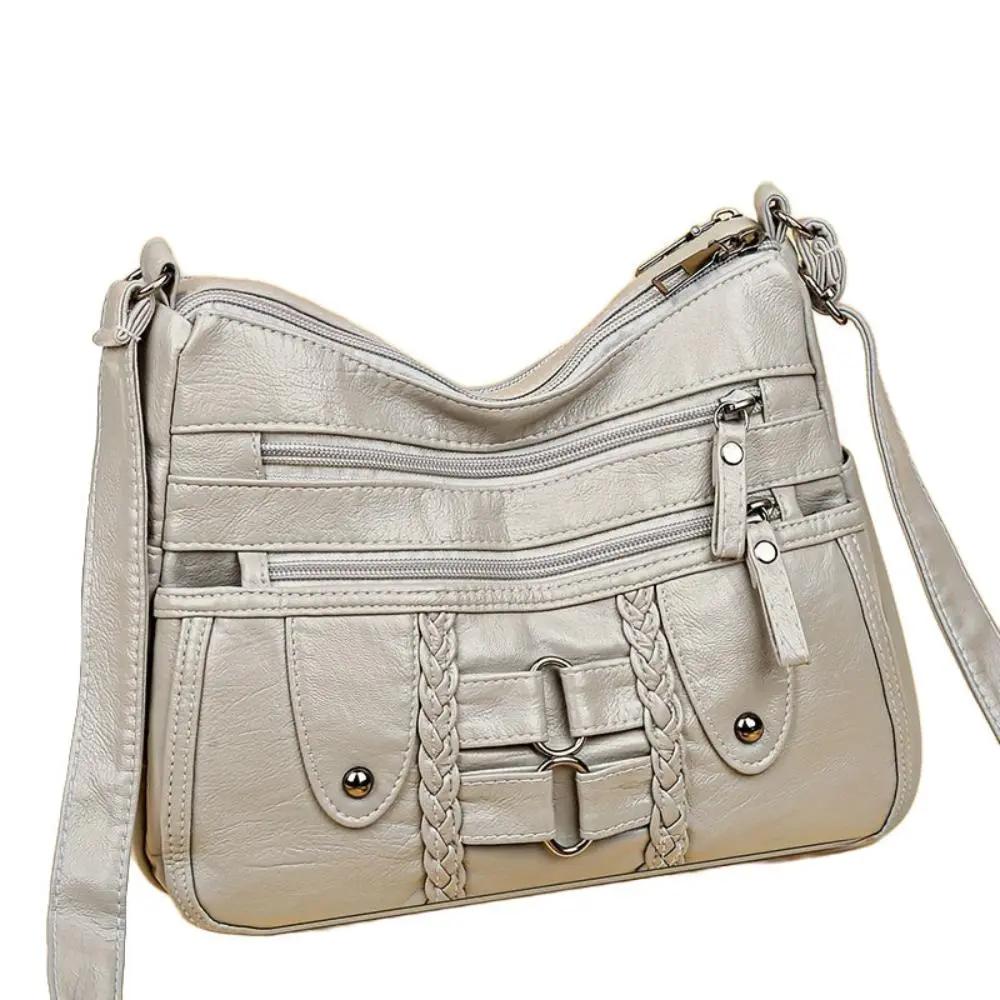 Sac bandoulière sécurisé Danoir Paris Ivy avec fermeture robuste et design élégant, vue sur le détail du sac.