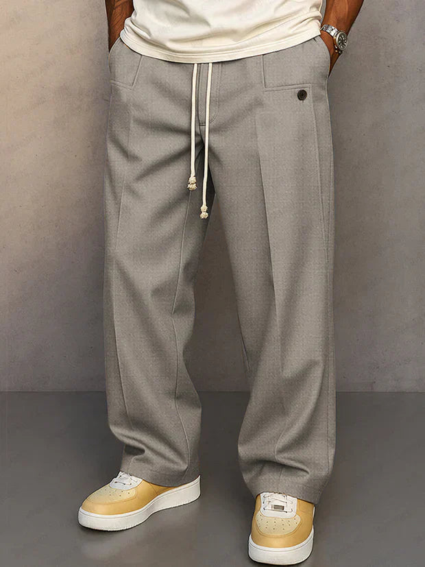 Pantalon élégant noir Danoir Paris Duval Paris avec cordon ajustable Didier, tissu fluide et coupe moderne.