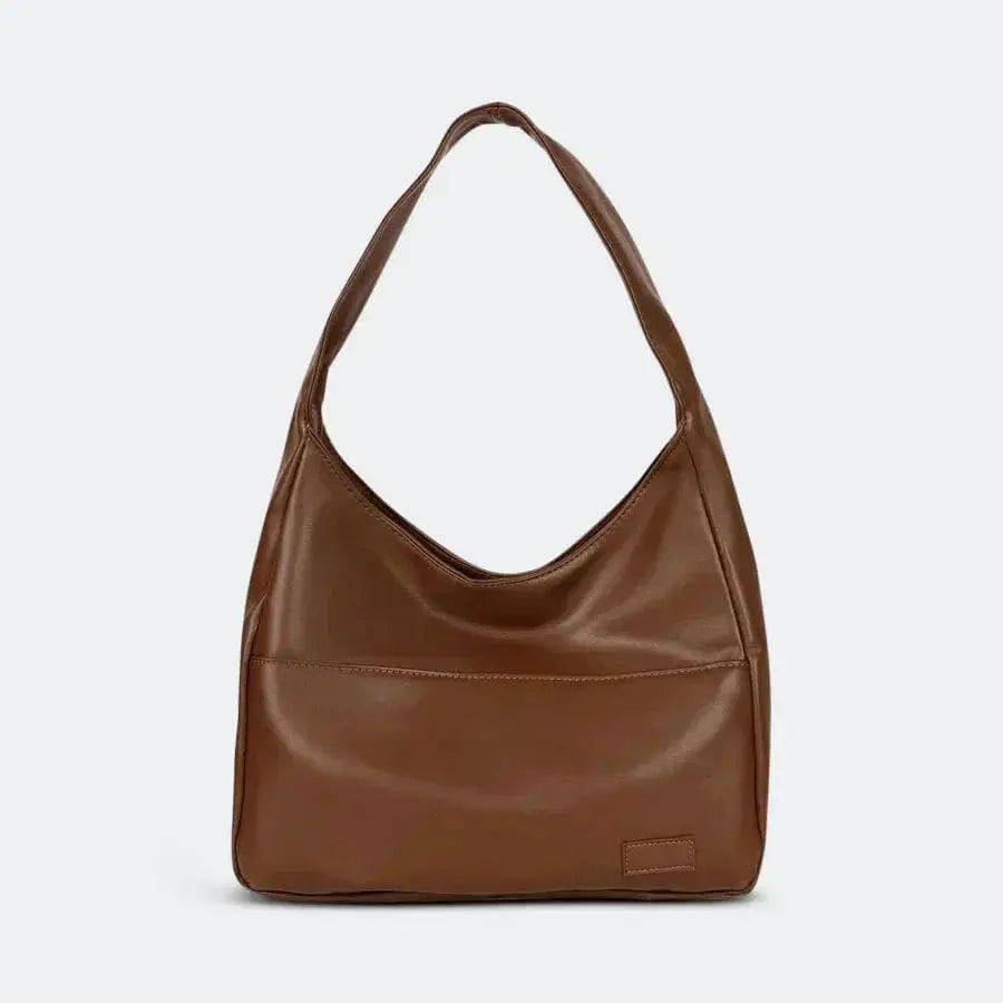 Sac cabas Nina de Danoir Paris, sac à main en cuir véritable, design épuré et pratique pour un style quotidien élégant.