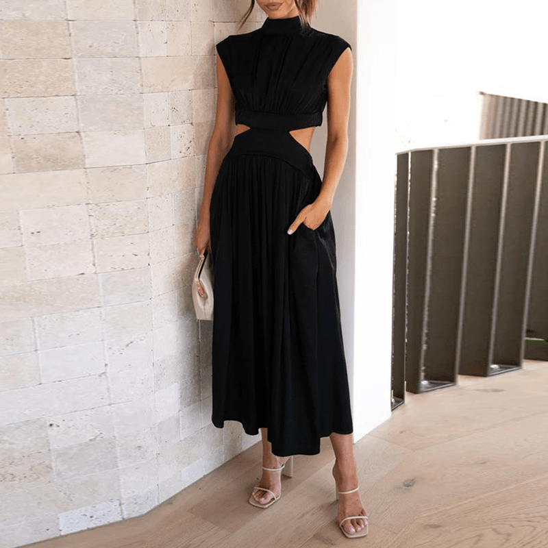 Robe longue élégante sans manches Danoir Paris avec col montant, drapée et plissée, idéale pour été et occasions spéciales.