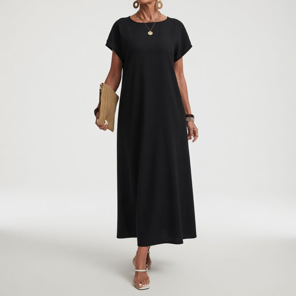 Robe longue élégante et minimaliste Margaux™ de Danoir Paris, vue de face, en tissu fluide, couleur neutre.