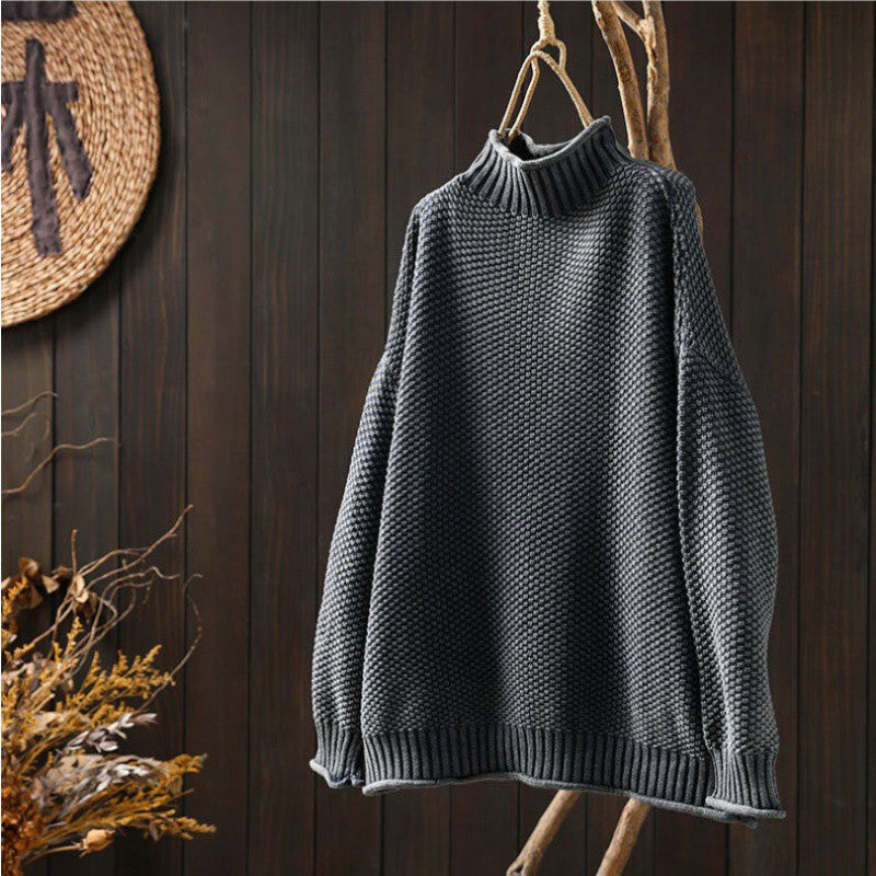 Pull tricoté élégant Mia de Danoir Paris, en laine douce, porté sur un mannequin avec col rond et manches longues.