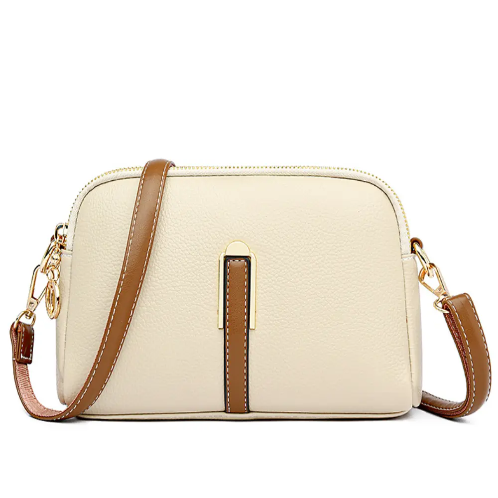 Sienna sac bandoulière Danoir Paris en cuir avec poches extérieures et bandoulière réglable, style confortable et élégant.