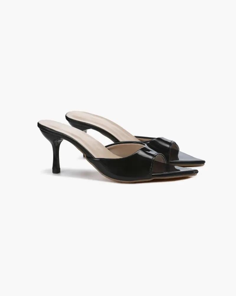 Escarpins Gia de Danoir Paris en cuir noir avec talons hauts élégants, vue de côté sur fond blanc.