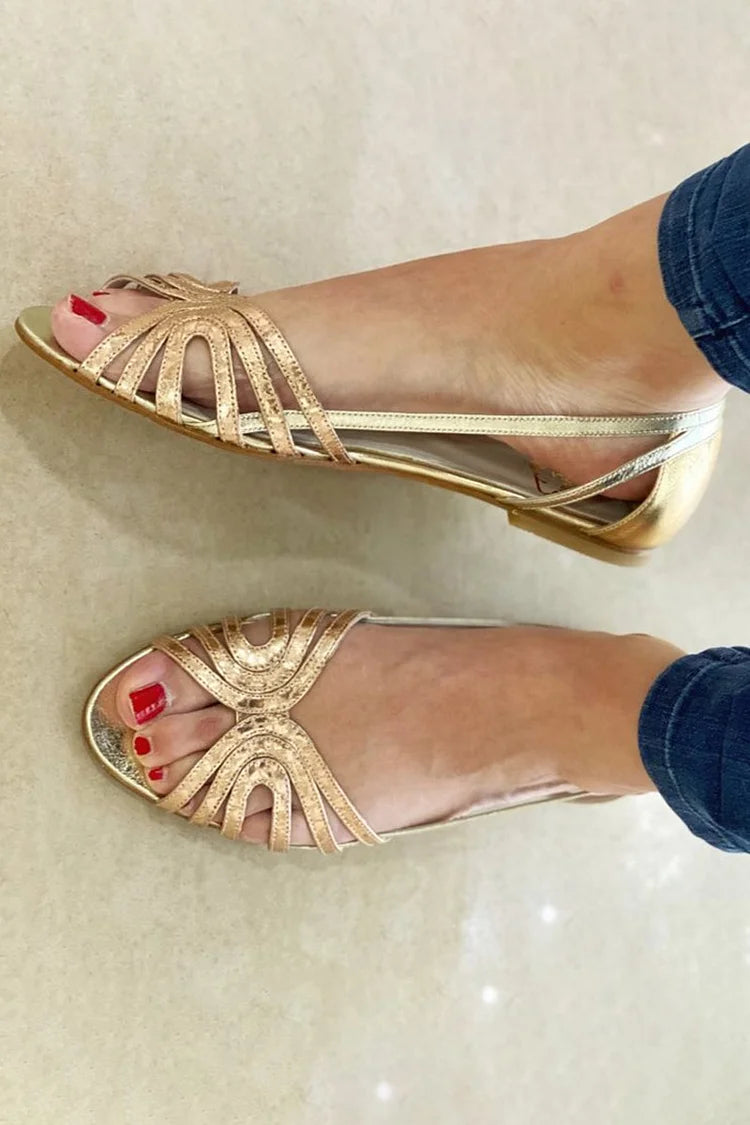 Sandales dorées Éléonore Danoir Paris, lumineuses, en cuir avec talon moyen, parfaites pour l'été et les occasions élégantes.