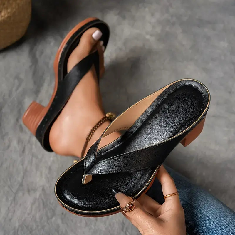 Sandales Danoir Paris élégantes et confortables, en cuir noir avec talon moyen, parfaites pour une allure sophistiquée.