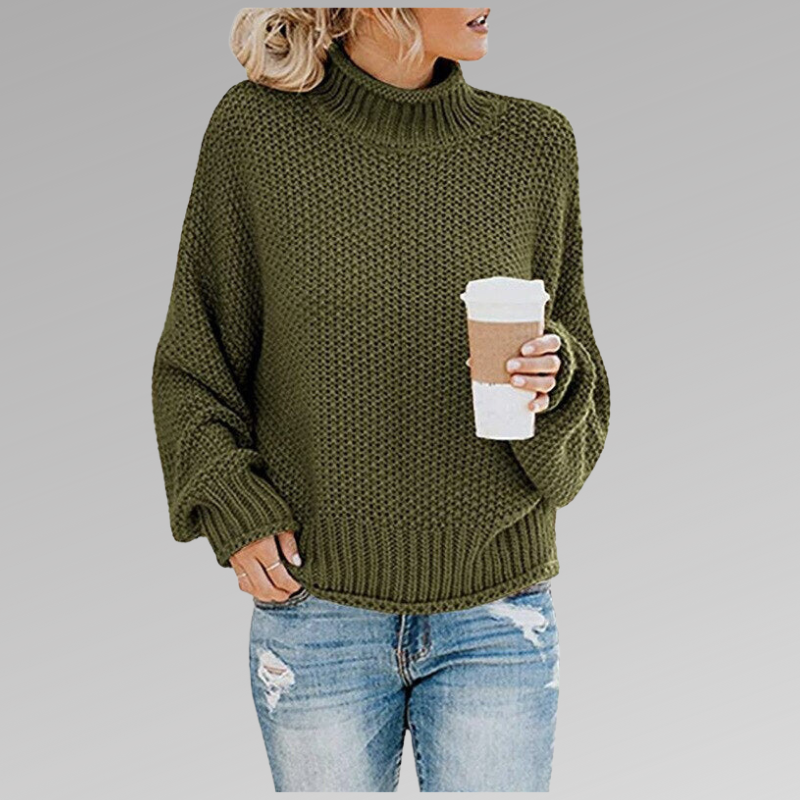 Pull décontracté et élégant Helena de Danoir Paris en orange, porté sur un mannequin, style chic et confort.