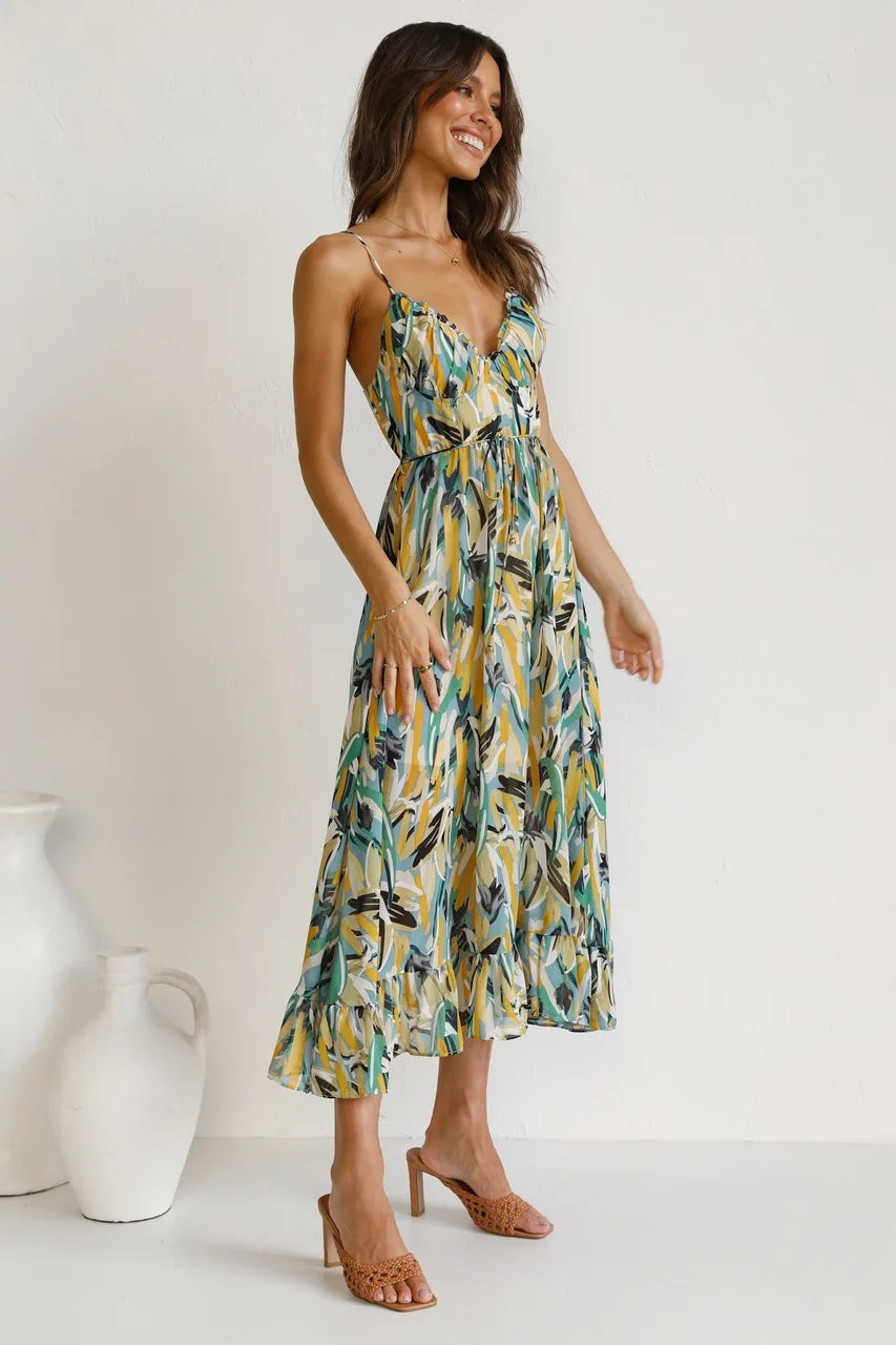 Robe fluide orange élégante de la marque Danoir Paris, vêtement léger et sophistiqué pour un style chic.