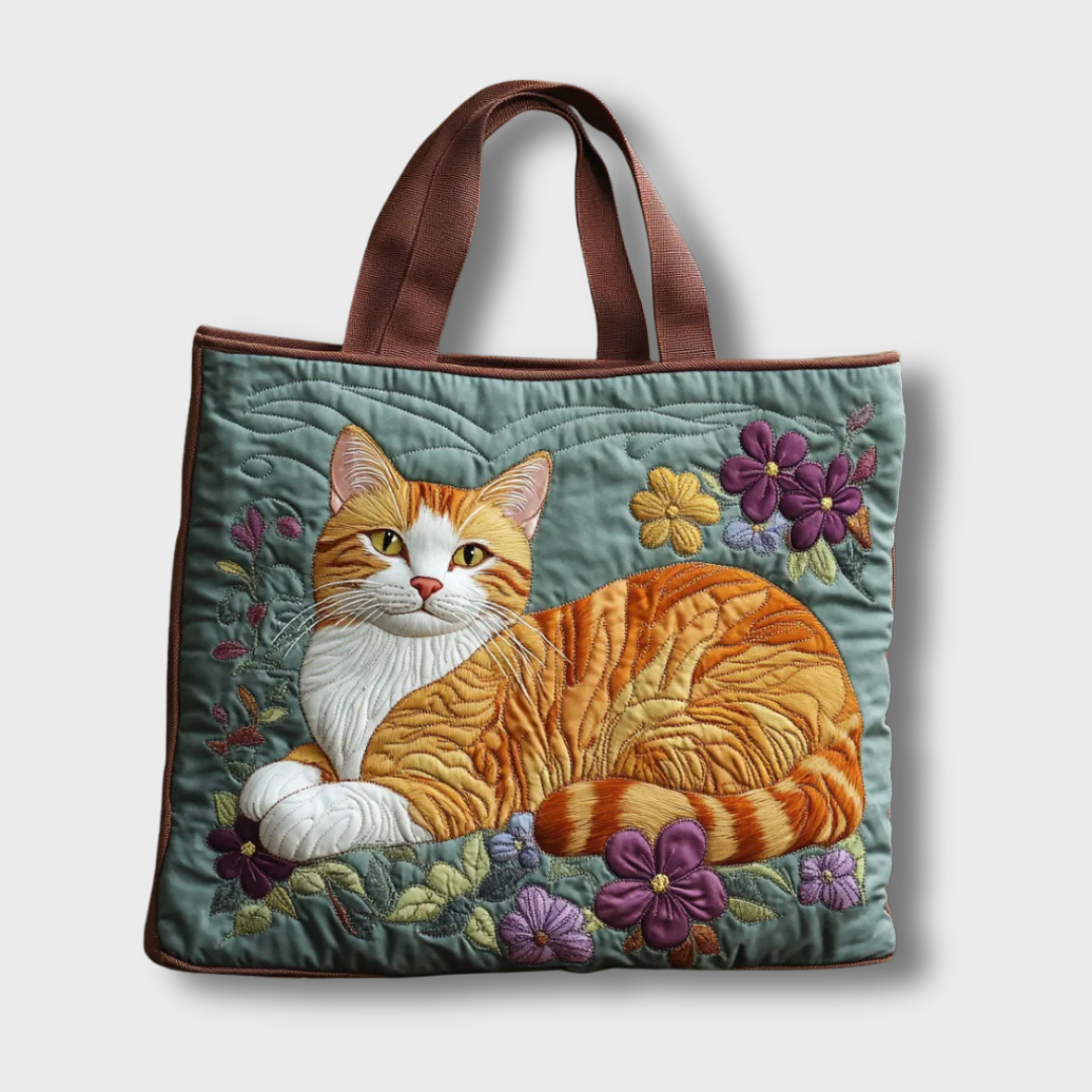 Sac à main Danoir Paris Sage, fait main, en cuir, avec poignée confortable, design pratique et élégant pour un usage quotidien.
