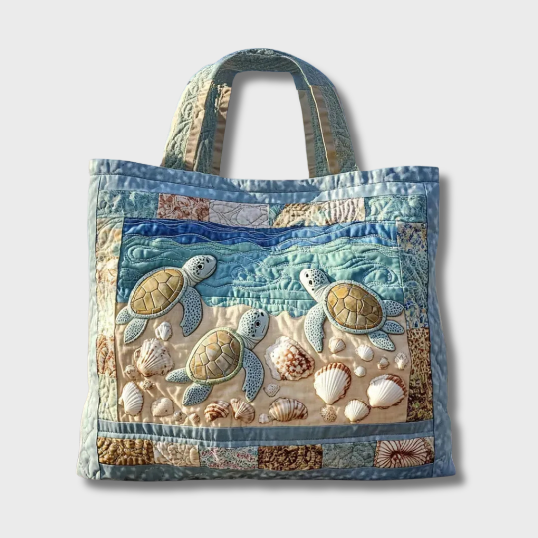 Sac à main quotidien en cuir souple Amelia de Danoir Paris, fait à la main, avec poignée et détails élégants.