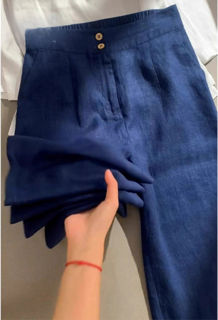 Pantalon Maia Danoir Paris en lin gris, style moderne et minimaliste, affiché avec guide des tailles sur fond blanc.