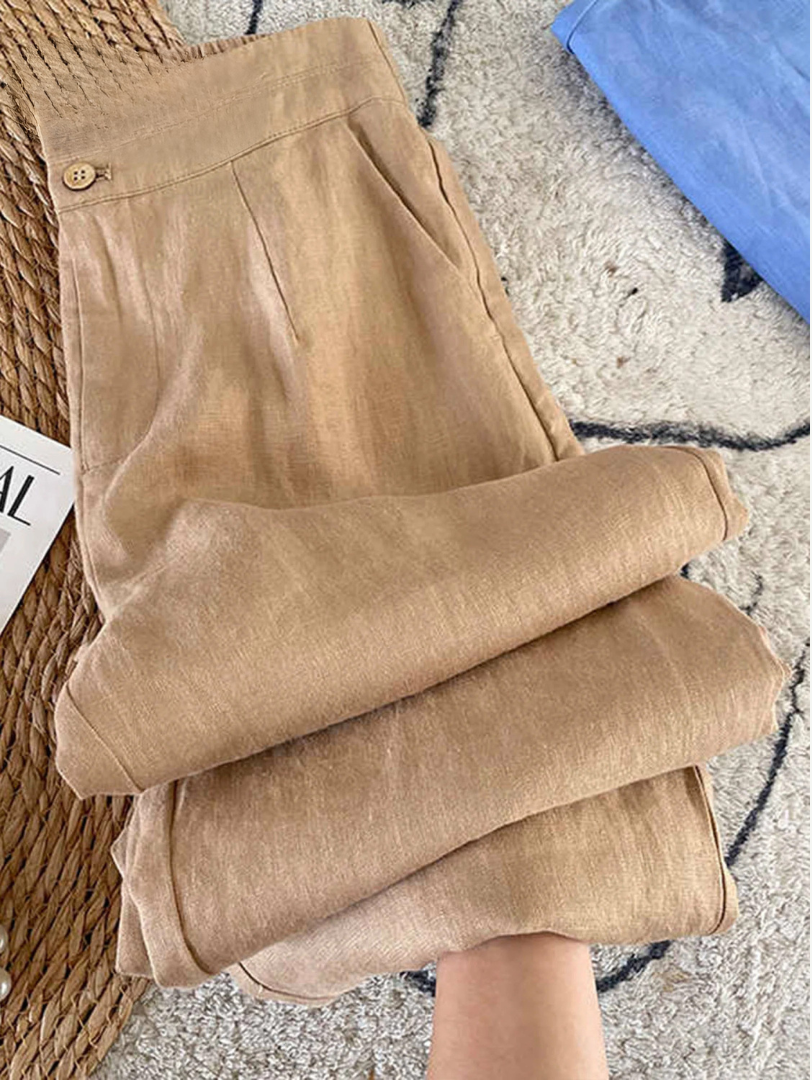 Pantalon Maia en lin gris de Danoir Paris, style moderne et minimaliste, avec guide des tailles visible dans l'image.