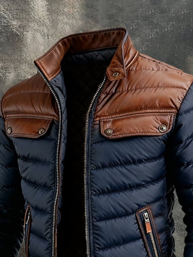 Veste matelassée bleu marine Maison Clément Paris™ avec empiècements en cuir, style élégant et moderne par Danoir Paris.