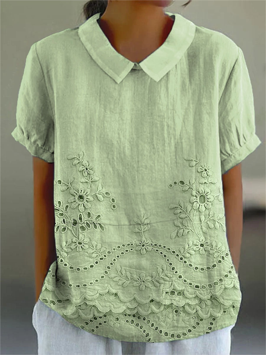 Chemise fluide Lily de Danoir Paris avec broderie florale colorée et détails délicats, vue de face sur mannequin.