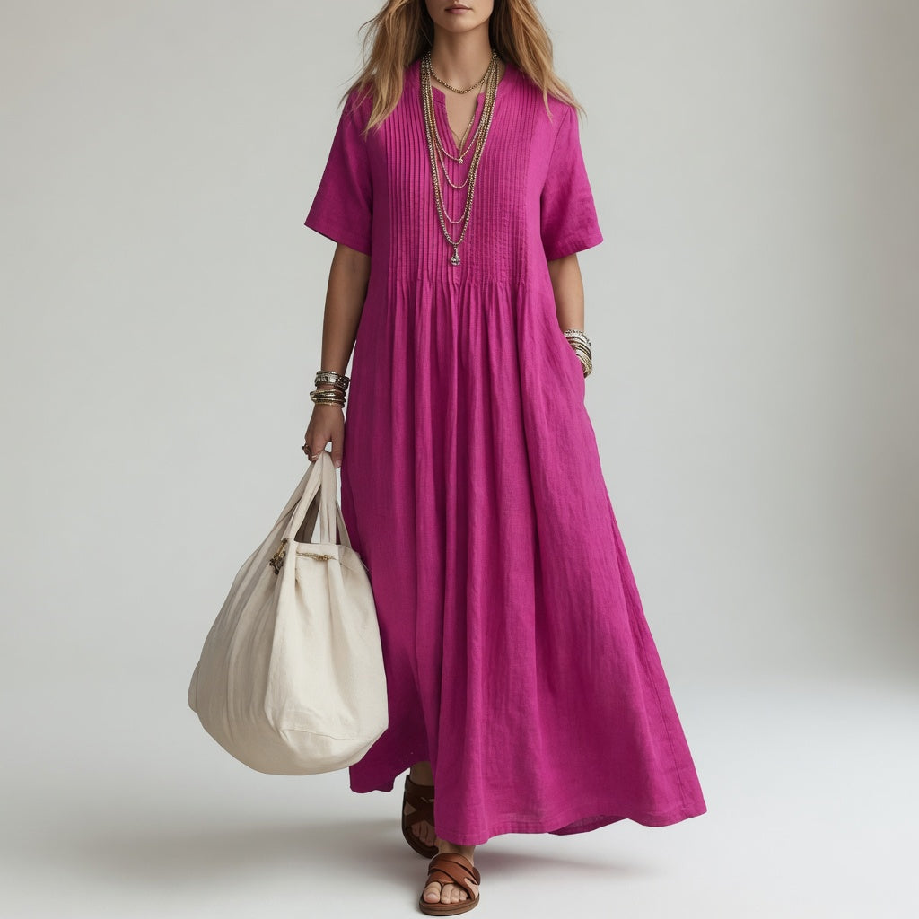 Robe longue en coton rouge Pélagie™ de Danoir Paris avec col V, style estival et liberté, portée par une femme.
