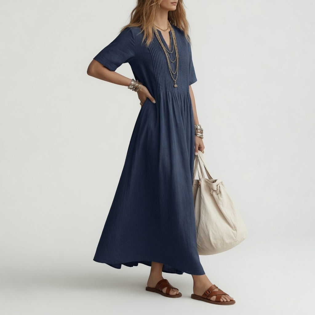 Robe longue en coton bleue Danoir Paris Pélagie™ avec col V, parfaite pour un style estival libre et léger.