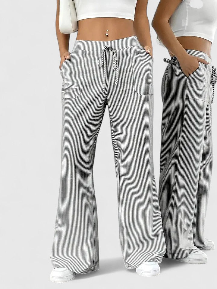 Pantalon large élégant Dominique de Danoir Paris, coupe fluide et tissu sophistiqué, porté en situation décontractée ou chic
