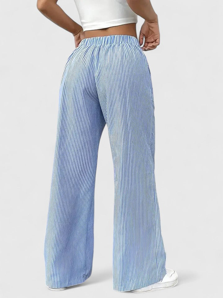 Pantalon large élégant Dominique de Danoir Paris, coupe fluide et tissu sophistiqué, porté sur un mannequin.