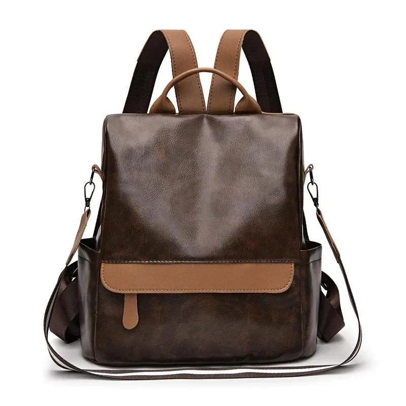 Sac à dos explorateur Lydia de Danoir Paris, en tissu noir avec poches zippées et bretelles ajustables, vue de face.