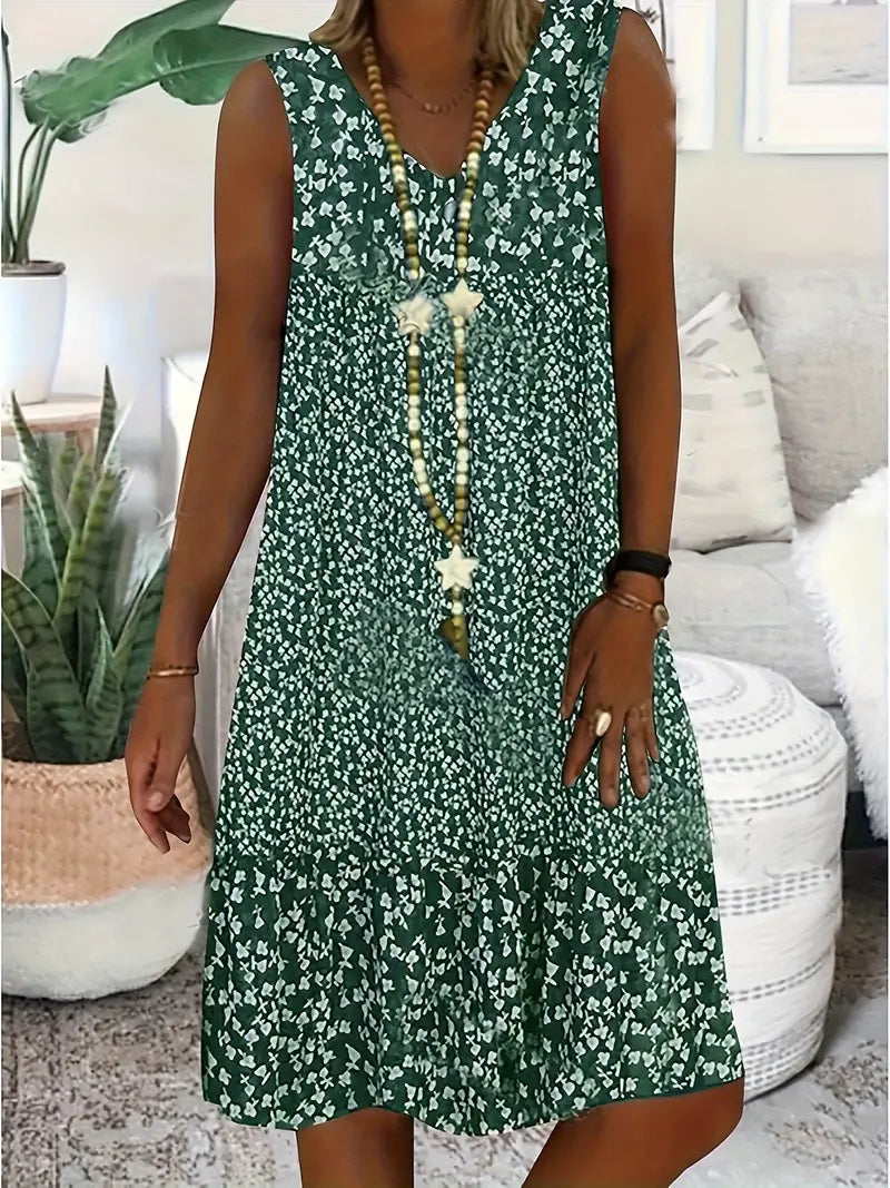 Robe élégante Danoir Paris Alena, robe polyvalente en tissu fluide avec col en V et manches longues, portée sur un mannequin blanc.