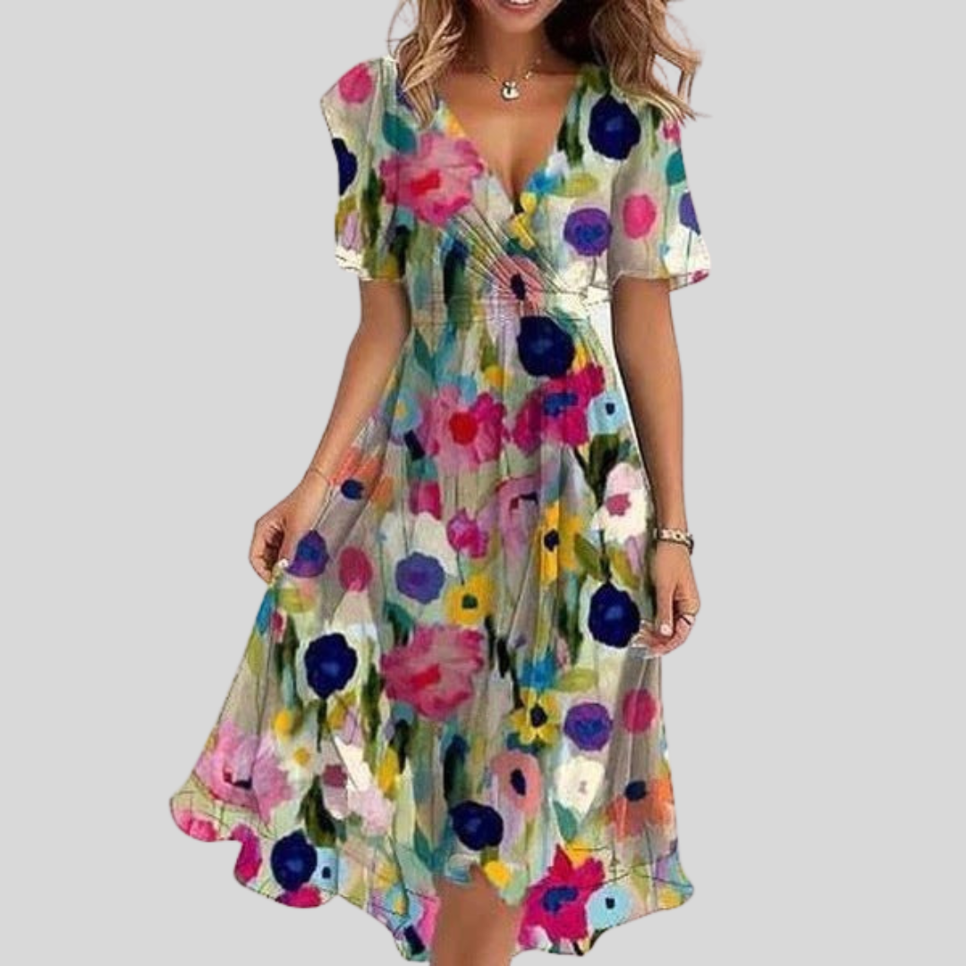 Robe d’été élégante Naomie de Danoir Paris, tissu léger et fluide, avec décolleté en V et détails raffinés.
