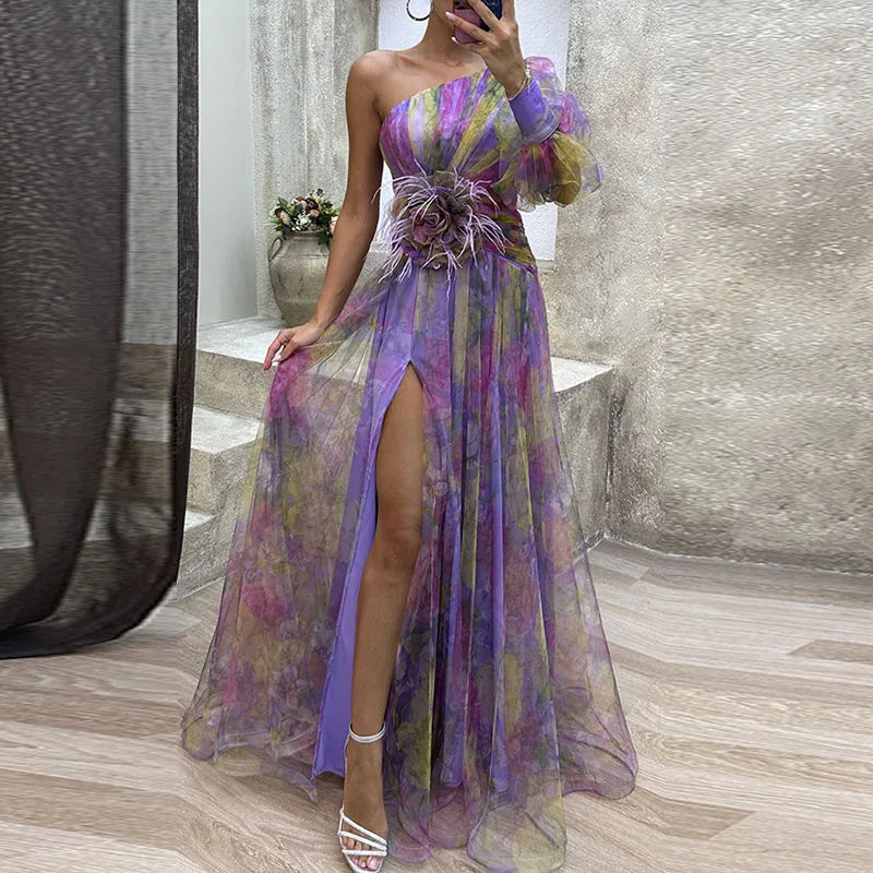 Robe longue colorée Philena de Danoir Paris, élégante, avec motifs vibrants, portée fluide et sophistiquée pour occasion spéciale.